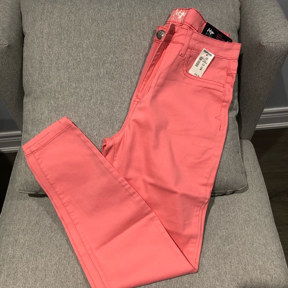Coral pink skinny jeans
